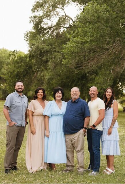 Mayor michele randall with her husband and adult kids.