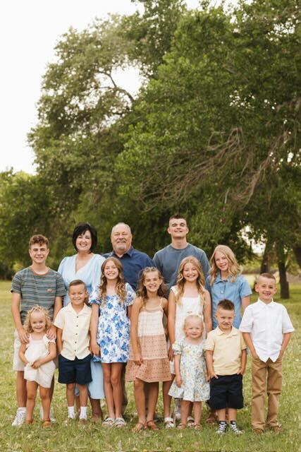 Mayor michele randall with her husband and grandkids.